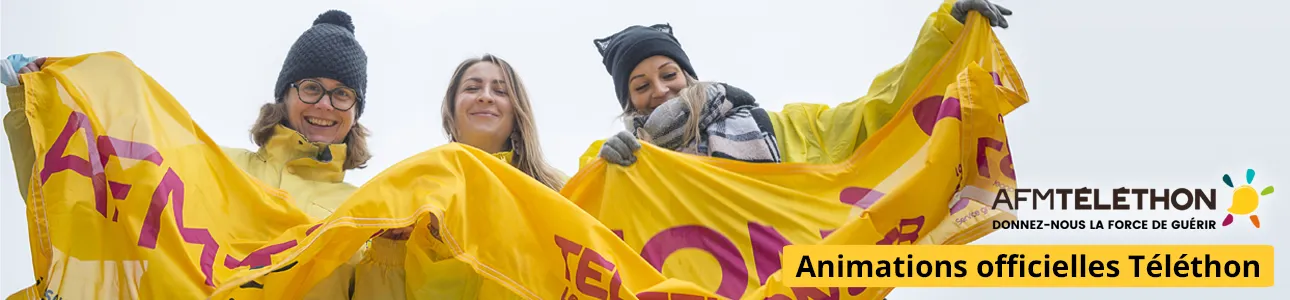 des bénévoles tiennent une banderole téléthon